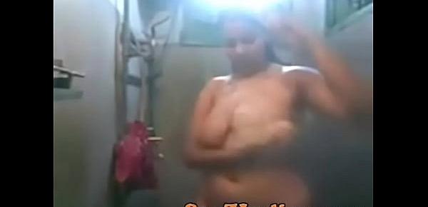  993451 thick indian slut wife films herself bathing